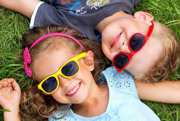 Kids with Glasses Smiling - Pediatric Dentist in Avon, CT